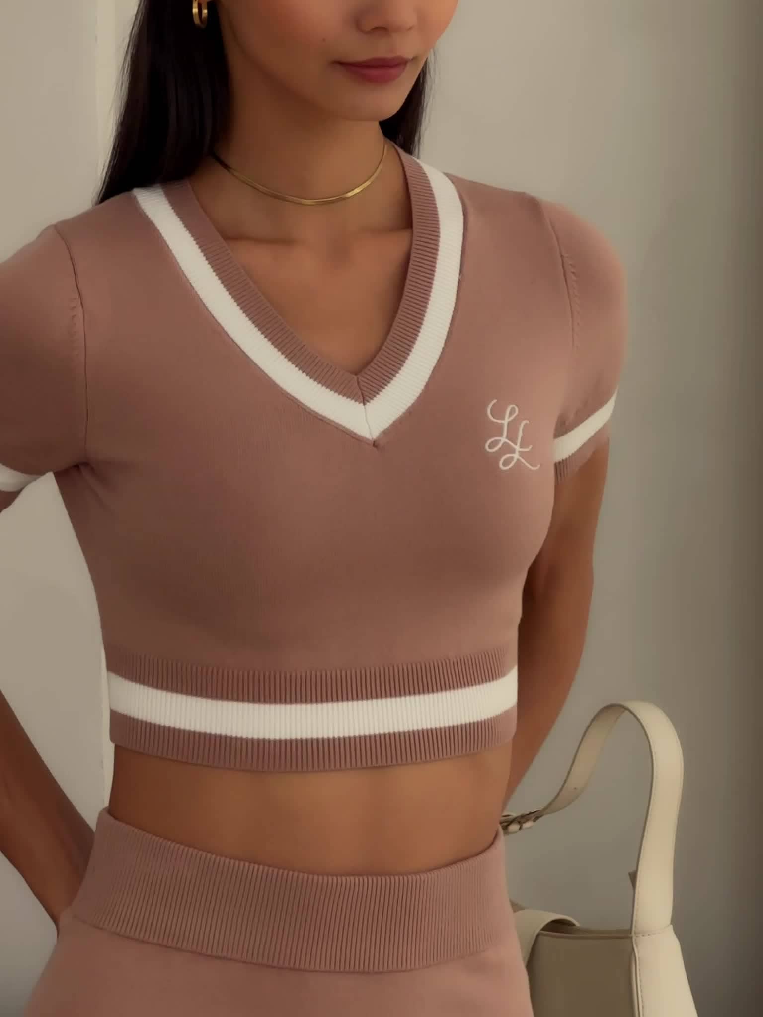 Cropped knit top with embroidered monogram :: LICHI - Online
